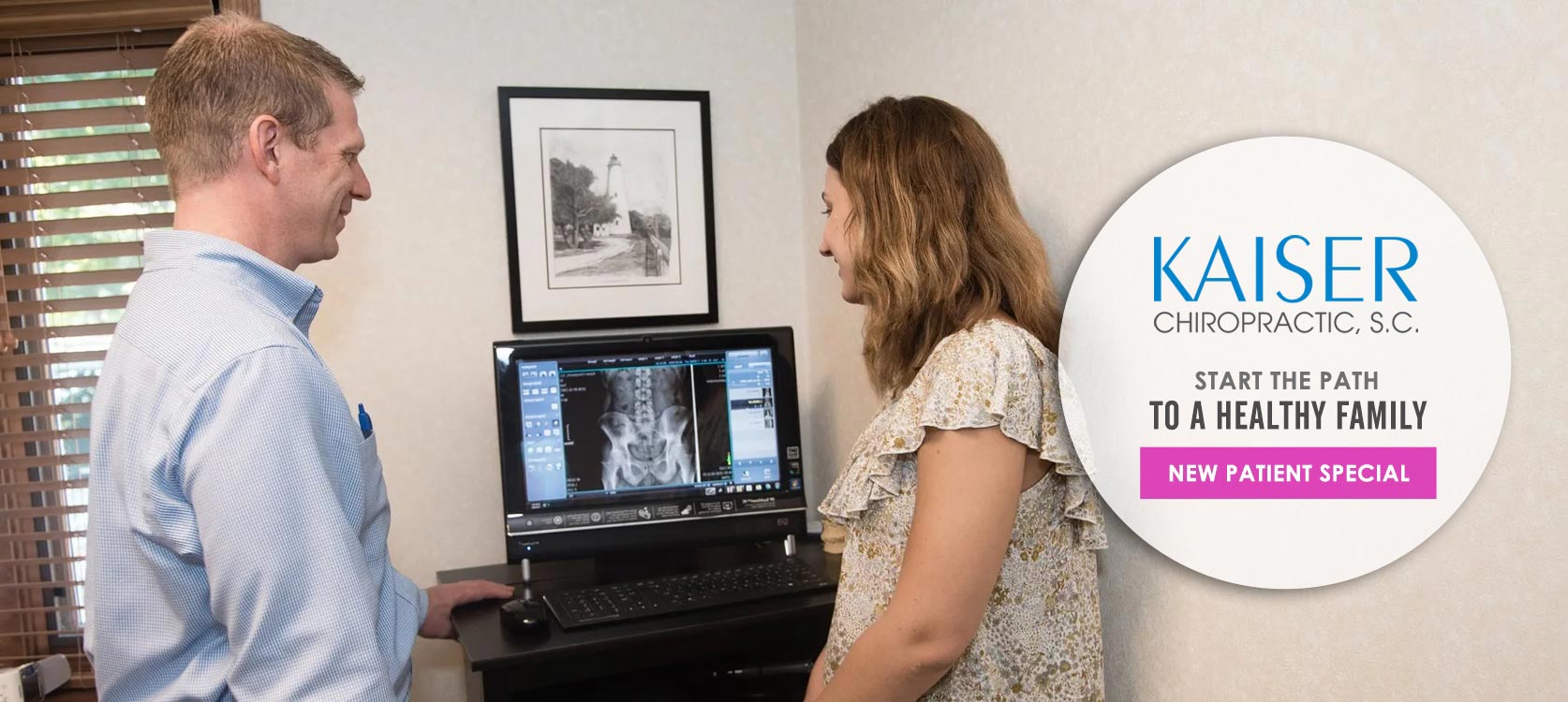 Chiropractor Lake Geneva WI Christopher Kaiser Reviewing XRay with Patient